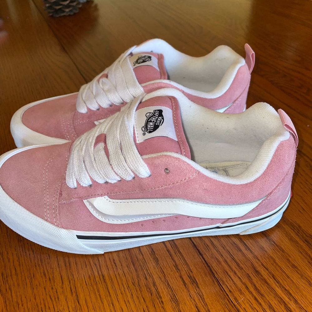 Pink and white Vans knu skool shoes